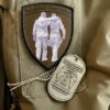 768-1024-1 Ärmelpatch auf Einsatzjacke mit Veteranensymbol