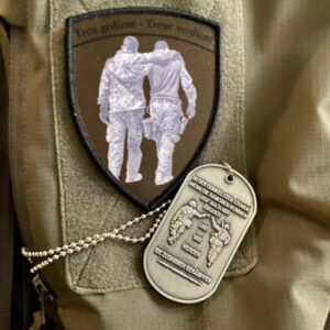 Ärmelpatch auf Einsatzjacke mit Veteranensymbol
